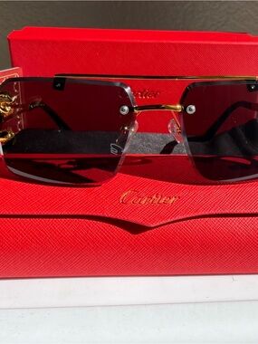 Cartier Sunglasses with Dark Red Lenses and Gold Accents
